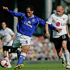 Lecott vs. Murphy: Intense Clash between Everton's Joleon Lescott and Fulham's Danny Murphy in Premier League Showdown (May 2009)