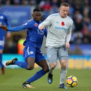 Leicester City vs Everton: Intense Battle for the Ball between Wilfred Ndidi and Wayne Rooney Leicester City vs Everton: Intense Battle for the Ball between Wilfred Ndidi and Wayne Rooney