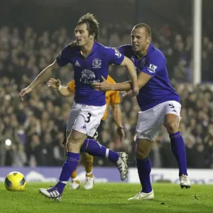 Leighton Baines Penalty Goal and Celebration with Heitinga: Everton's Victory Moment vs. Wolverhampton Wanderers (Nov 2011) Leighton Baines Penalty Goal and Celebration with Heitinga: Everton's Victory Moment vs. Wolverhampton Wanderers (Nov 2011)