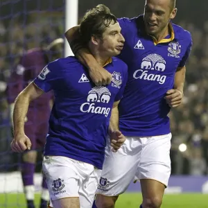Leighton Baines Scores and Celebrates with Heitinga: Everton's Penalty Goal vs. Wolverhampton Wanderers (Nov 2011) Leighton Baines Scores and Celebrates with Heitinga: Everton's Penalty Goal vs. Wolverhampton Wanderers (Nov 2011)