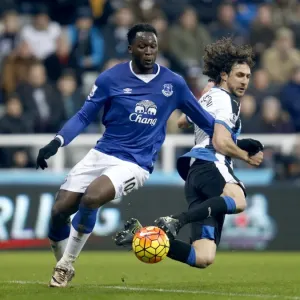 A print of a photograph showing Lukaku and Coloccini in action