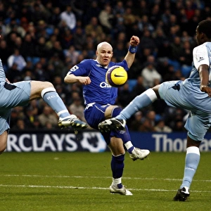 Manchester City v Everton Andrew Johnson is challenged by Nedum Onuoha and Richard Dunne