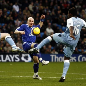 Manchester City v Everton Andrew Johnson is challenged by Nedum Onuoha and Richard Dunne