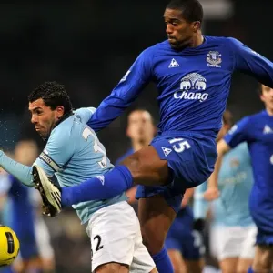 Manchester Derby Showdown: Distin vs Tevez - A Battle for Premier League Supremacy (December 2010) Manchester Derby Showdown: Distin vs Tevez - A Battle for Premier League Supremacy (December 2010)