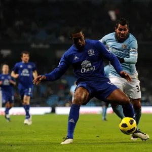 Manchester Derby Showdown: Distin vs Tevez - A Football Rivalry Manchester Derby Showdown: Distin vs Tevez - A Football Rivalry