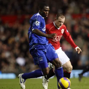 Manchester United v Everton Joseph Yobo Everton in action against Wayne Rooney