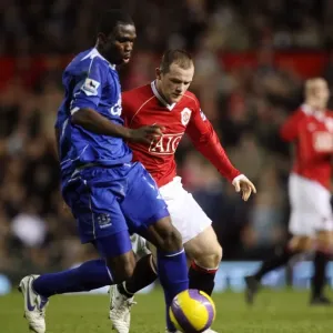 Manchester United v Everton Joseph Yobo Everton in action against Wayne Rooney