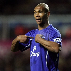 Marcus Bent Challenges the Referee's Call at Everton Football Club