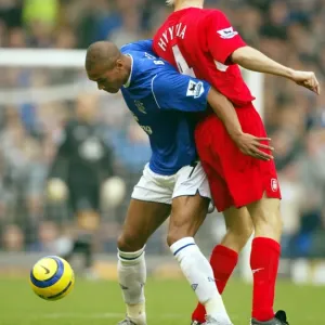Marcus Bent shields the ball from Sami Hyypia Marcus Bent shields the ball from Sami Hyypia