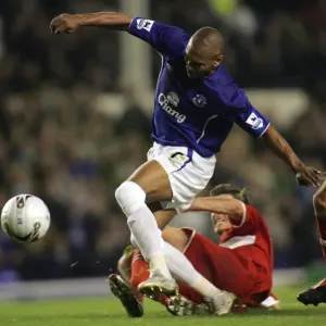 Marcus Bent vs. Nemeth: A Tight Tackle in Everton Football Club Marcus Bent vs. Nemeth: A Tight Tackle in Everton Football Club