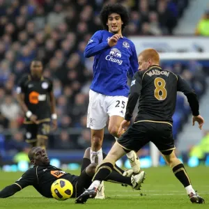 Marouane Fellaini in Action: Everton vs. Wigan Athletic (11 December 2010, Goodison Park) - A Battle Against Hendry Thomas and Ben Watson