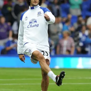 Marouane Fellaini in Action: Everton vs. Queens Park Rangers, Premier League Clash (2011) Marouane Fellaini in Action: Everton vs. Queens Park Rangers, Premier League Clash (2011)