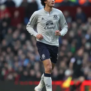 Marouane Fellaini: Everton's Midfield Maestro in the Thrilling Rivalry against Aston Villa (14 January 2012) Marouane Fellaini: Everton's Midfield Maestro in the Thrilling Rivalry against Aston Villa (14 January 2012)