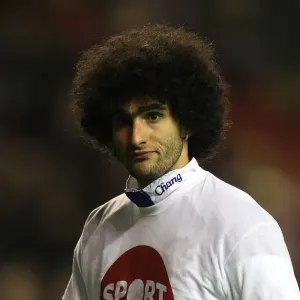 Marouane Fellaini: Everton's Unyielding Presence in the Premier League Showdown at Anfield (13 March 2012) Marouane Fellaini: Everton's Unyielding Presence in the Premier League Showdown at Anfield (13 March 2012)