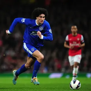 Marouane Fellaini Stares Down Opponent in Scoreless Arsenal vs. Everton Barclays Premier League Match (16-04-2013) Marouane Fellaini Stares Down Opponent in Scoreless Arsenal vs. Everton Barclays Premier League Match (16-04-2013)