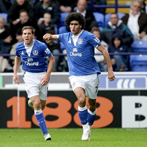 Marouane Fellaini's Double: Everton's Celebration Against Bolton Wanderers in the Premier League