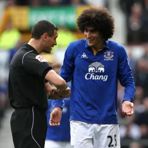 Marouane Fellaini's Heated Confrontation with Referee Andre Marriner during FA Cup Sixth Round Match at Goodison Park Marouane Fellaini's Heated Confrontation with Referee Andre Marriner during FA Cup Sixth Round Match at Goodison Park