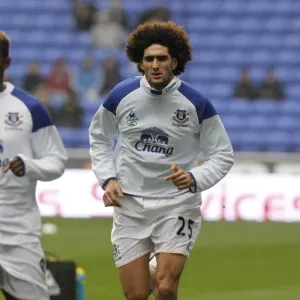 Marouane Fellaini's Intense Focus: Everton Star's Pre-Game Warm-Up at Reebok Stadium (Bolton Wanderers vs. Everton, 26 November 2011) Marouane Fellaini's Intense Focus: Everton Star's Pre-Game Warm-Up at Reebok Stadium (Bolton Wanderers vs. Everton, 26 November 2011)