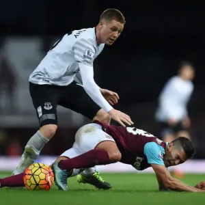 McCarthy vs. Lanzini: A Battle for the Ball in the West Ham United vs. Everton Premier League Clash McCarthy vs. Lanzini: A Battle for the Ball in the West Ham United vs. Everton Premier League Clash