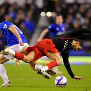 Mikel Arteta vs. Jobi McAnuff: A Battle for the Ball in Everton's FA Cup Fifth Round Clash (01 March 2011) Mikel Arteta vs. Jobi McAnuff: A Battle for the Ball in Everton's FA Cup Fifth Round Clash (01 March 2011)
