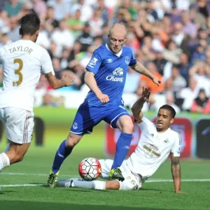 Naismith vs. Naughton: A Battle for Ball Possession - Everton vs. Swansea, Premier League Naismith vs. Naughton: A Battle for Ball Possession - Everton vs. Swansea, Premier League