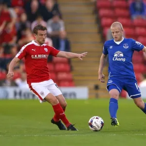 Naismith vs. Winnall: Battle for the Ball in Barnsley vs. Everton Capital One Cup Clash Naismith vs. Winnall: Battle for the Ball in Barnsley vs. Everton Capital One Cup Clash