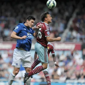 Noble vs. Barry: A Battle of Midfield Masters in the Barclays Premier League - West Ham United vs. Everton at Upton Park Noble vs. Barry: A Battle of Midfield Masters in the Barclays Premier League - West Ham United vs. Everton at Upton Park