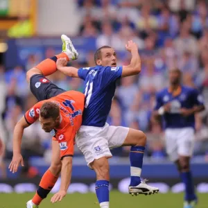 Osman vs. Buzsaky: A Battle at Goodison Park - Everton vs. Queens Park Rangers, Barclays Premier League (2011) Osman vs. Buzsaky: A Battle at Goodison Park - Everton vs. Queens Park Rangers, Barclays Premier League (2011)