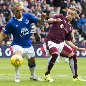Osman vs. McKirdy: A Battle for the Ball in Everton's Pre-Season Clash at Tynecastle Stadium Osman vs. McKirdy: A Battle for the Ball in Everton's Pre-Season Clash at Tynecastle Stadium