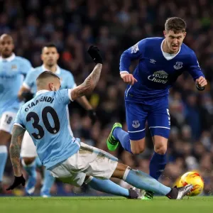 Otamendi vs. Stones: A Battle for Supremacy in the Capital One Cup Semi-Final Clash between Manchester City and Everton Otamendi vs. Stones: A Battle for Supremacy in the Capital One Cup Semi-Final Clash between Manchester City and Everton