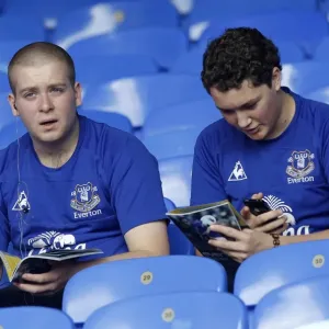 Passionate Rivalry: Everton vs Liverpool at Goodison Park (2011) - A Sea of Unwavering Fan Devotion: Everton Fans Fervor at the 01 October 2011 Everton vs Liverpool Match Passionate Rivalry: Everton vs Liverpool at Goodison Park (2011) - A Sea of Unwavering Fan Devotion: Everton Fans Fervor at the 01 October 2011 Everton vs Liverpool Match