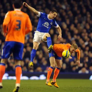 Print of Phil Jagielka vs. Dean Furman in FA Cup Action at Goodison Park Print of Phil Jagielka vs. Dean Furman in FA Cup Action at Goodison Park