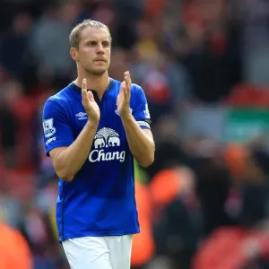 Phil Jagielka's Triumphant Moment: Everton's Victory Celebration at Anfield - Barclays Premier League Phil Jagielka's Triumphant Moment: Everton's Victory Celebration at Anfield - Barclays Premier League
