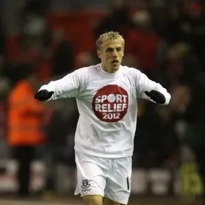 Phil Neville: Everton vs. Liverpool Rivalry at Anfield, Barclays Premier League (13 March 2012) Phil Neville: Everton vs. Liverpool Rivalry at Anfield, Barclays Premier League (13 March 2012)