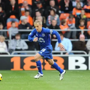 Phil Neville Leads Everton in Barclays Premier League Battle at Bloomfield Road Against Blackpool Phil Neville Leads Everton in Barclays Premier League Battle at Bloomfield Road Against Blackpool