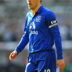 Phil Neville Leads Everton in Intense Showdown against Swansea City at Liberty Stadium (BPL 2012) Phil Neville Leads Everton in Intense Showdown against Swansea City at Liberty Stadium (BPL 2012)