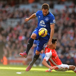 Premier League: Jagielka Tackles Sanchez in Intense Arsenal vs. Everton Clash