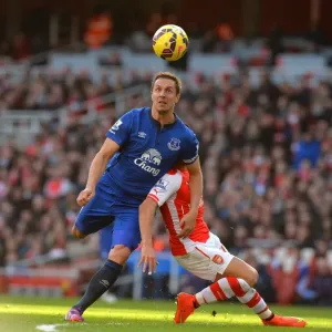 Premier League: Phil Jagielka Tackles Alexis Sanchez of Arsenal during Everton vs Arsenal Match