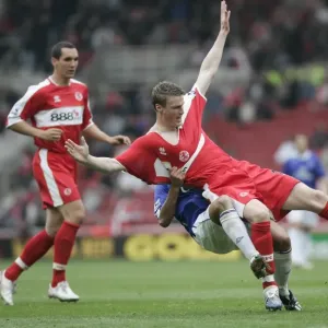 The Riverside Stadium -Middlesbroughs Robert Huth is pulled to ground by Simon Davies of Everton The Riverside Stadium -Middlesbroughs Robert Huth is pulled to ground by Simon Davies of Everton