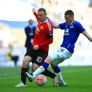 Rooney vs McCarthy: An Intense Battle - Everton vs Manchester United FA Cup Semi-Final at Wembley Stadium Rooney vs McCarthy: An Intense Battle - Everton vs Manchester United FA Cup Semi-Final at Wembley Stadium