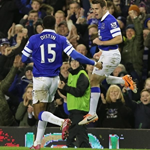 Seamus Coleman and Sylvain Distin: Everton's Unstoppable Duo Celebrate Second Goal Against Fulham (14-12-2013, Goodison Park)
