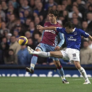 Simon Davies - Everton in action against Juan Pablo Angel - Aston Villa