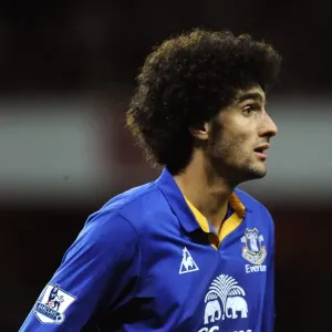 Tense Battle: Marouane Fellaini at Emirates Stadium - Arsenal vs. Everton, Barclays Premier League (10 December 2011) Tense Battle: Marouane Fellaini at Emirates Stadium - Arsenal vs. Everton, Barclays Premier League (10 December 2011)