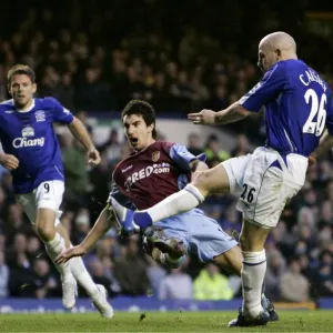 Tense Moment: Lee Carsley's Shot Amidst Ridgewell's Pressure at Goodison Park, Everton vs Aston Villa, FA Barclays Premiership, 11/11/06