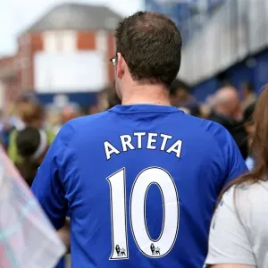 Thrilled Everton Fans Gathering at Goodison Park Before the Everton vs. Wolverhampton Wanderers Premier League Showdown (2010) Thrilled Everton Fans Gathering at Goodison Park Before the Everton vs. Wolverhampton Wanderers Premier League Showdown (2010)