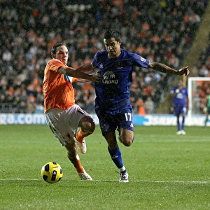 Tim Cahill vs. David Vaughan: A Battle at Everton vs. Blackpool, Premier League
