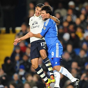 Tim Cahill vs. Paulo Ferreira: Premier League Battle - Everton's Clash with Chelsea (Dec. 4, 2010)