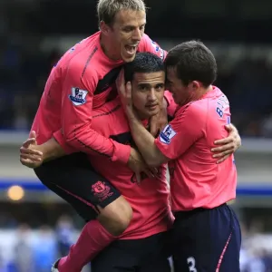 Triumphant Trio: Cahill, Baines, and Neville's Double Celebration (Everton Football Club) Triumphant Trio: Cahill, Baines, and Neville's Double Celebration (Everton Football Club)
