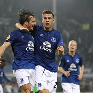 United in Victory: Coleman and Baines Celebrate Everton's Europa League Goals vs. VfL Wolfsburg