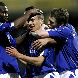 Watford v Everton - Leon Osman celebrates after scoring the third goal for Everton with Joseph Yo